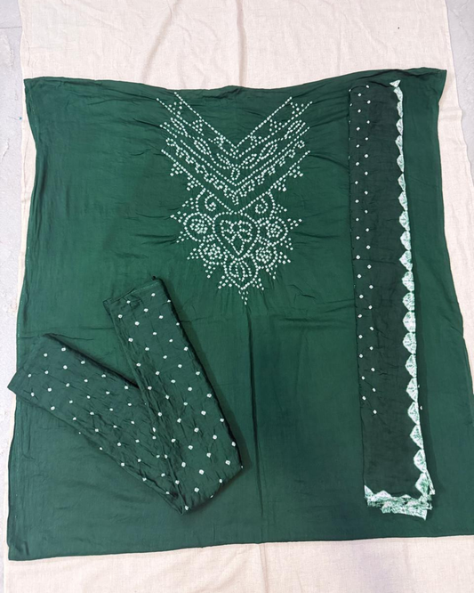 Green bandhani suit fabric on a white background