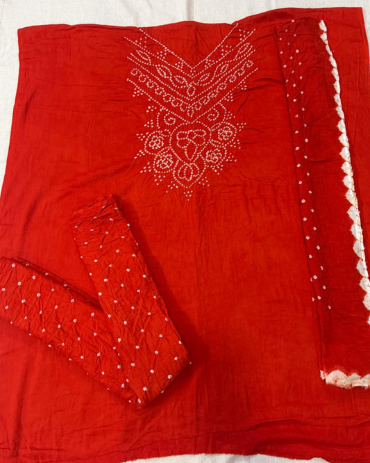 Orange Bandhani fabric on a white background