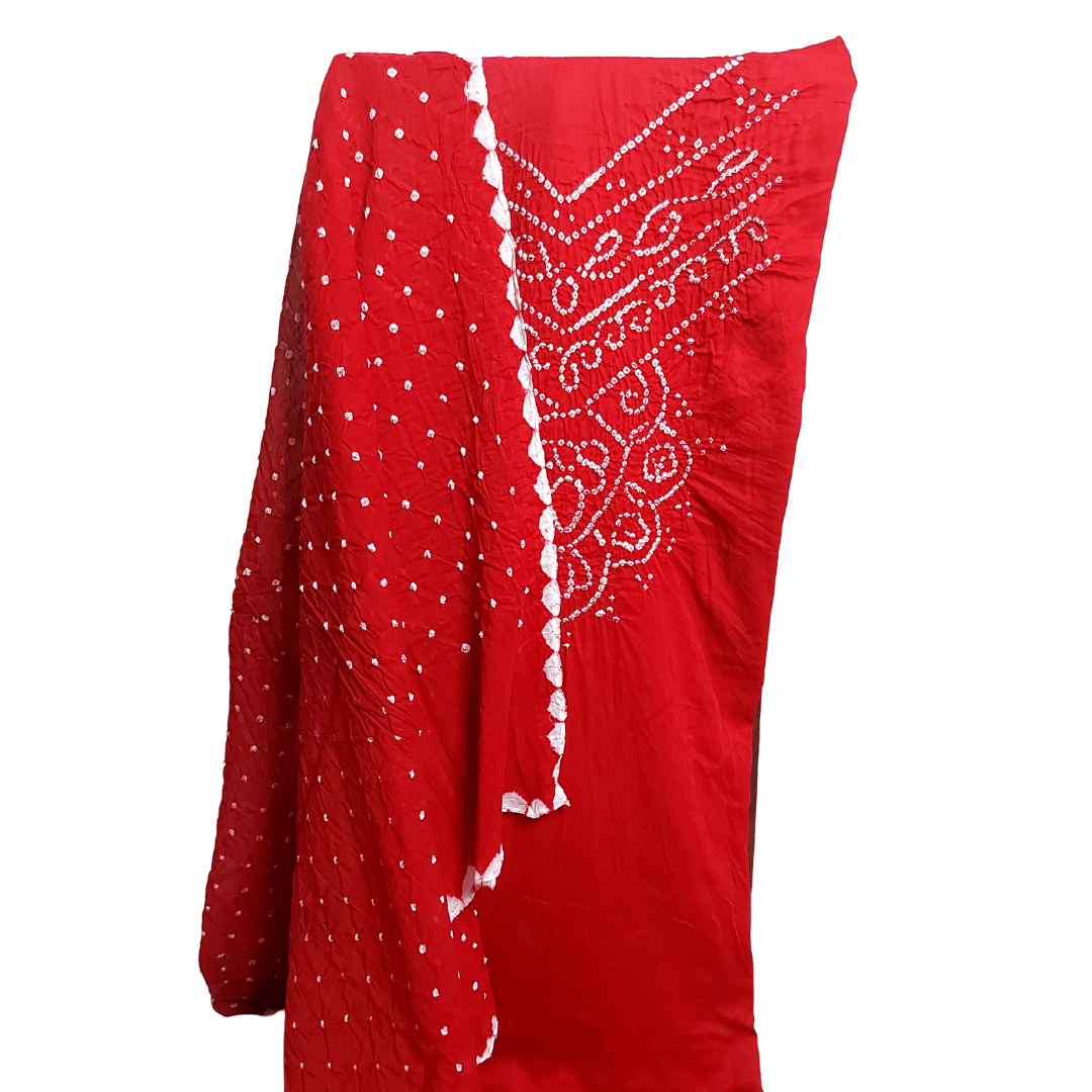 Red bandhani fabric a white background