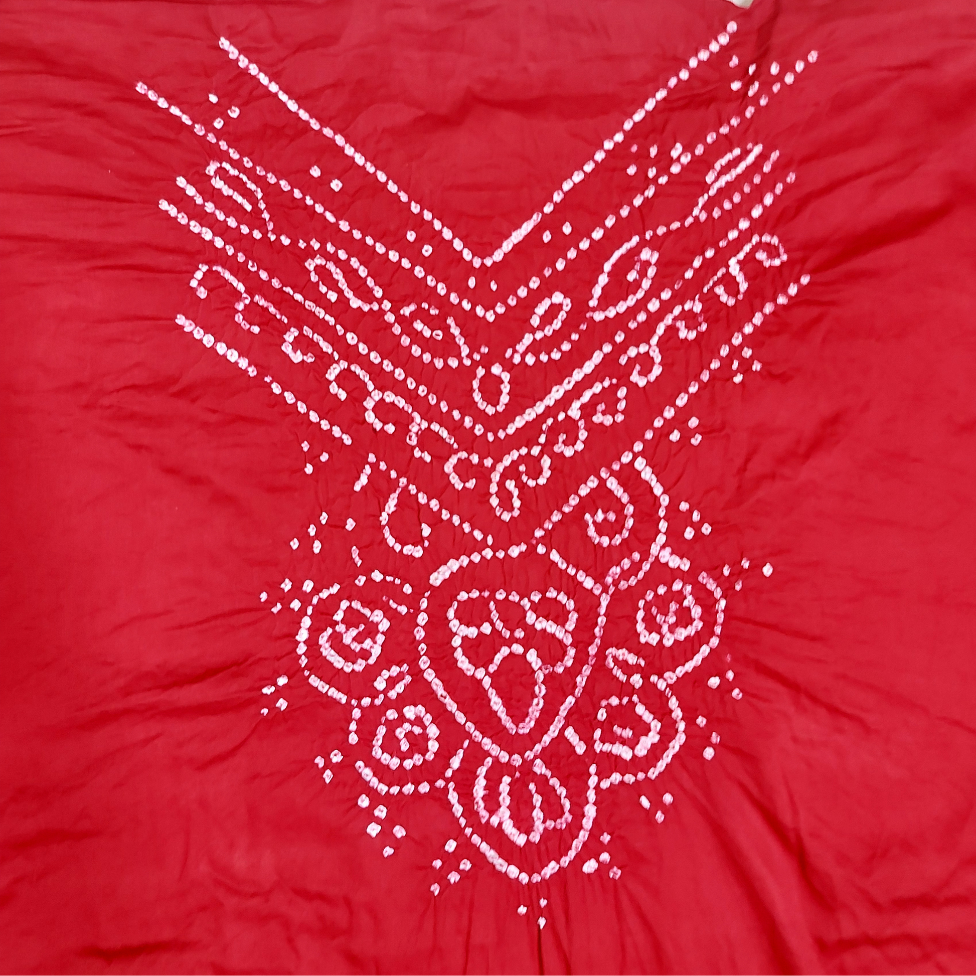 Red bandhanifabric close up