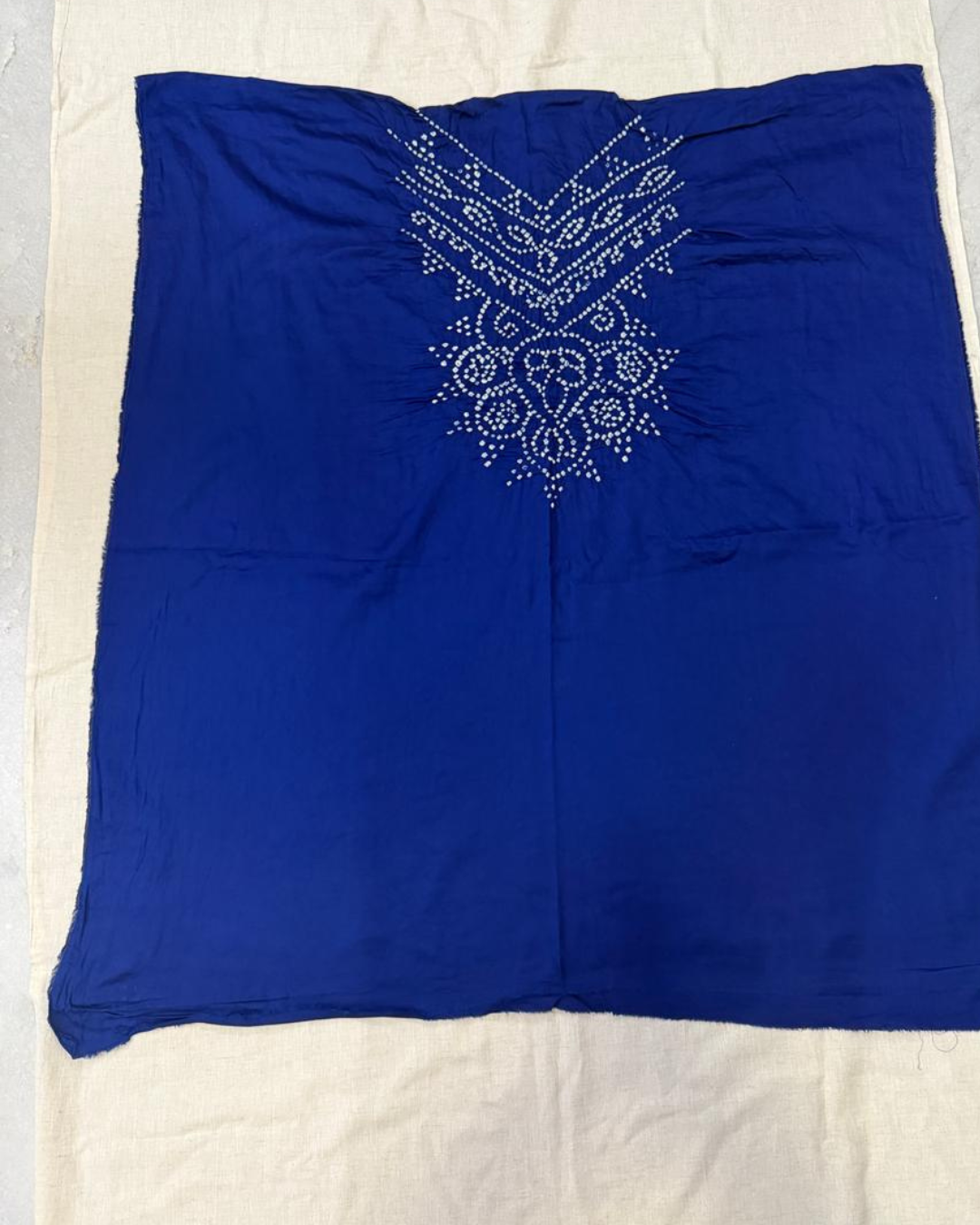 Blue top  on a white background