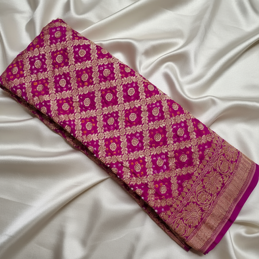 banarasi georgette pink bandhani blouse piece flat lay on white fabric