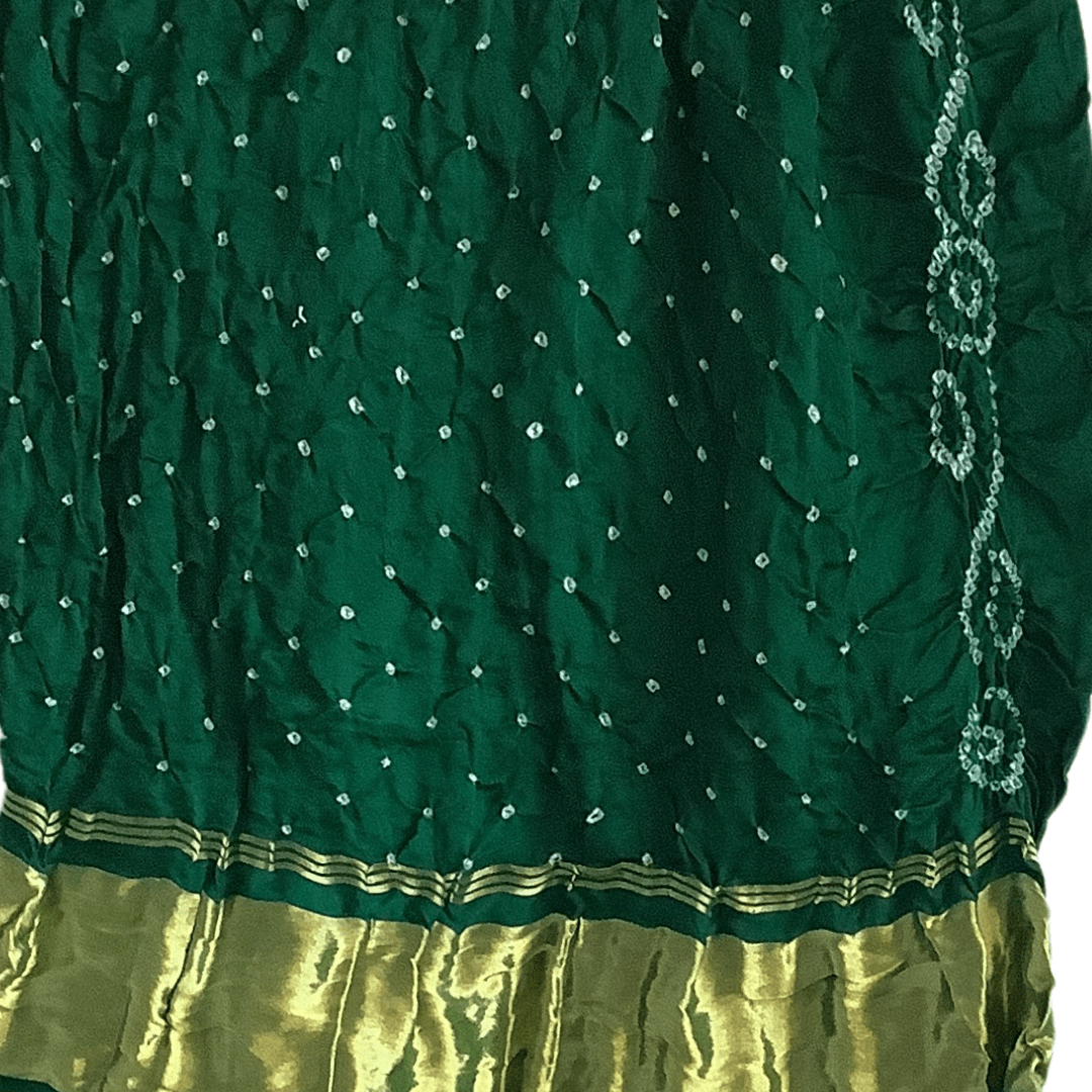 close up of green bandhani blouse piece