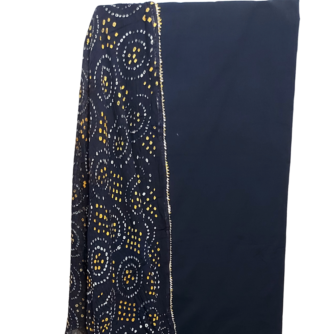 close up of black bandhani dupatta with black plain fabric