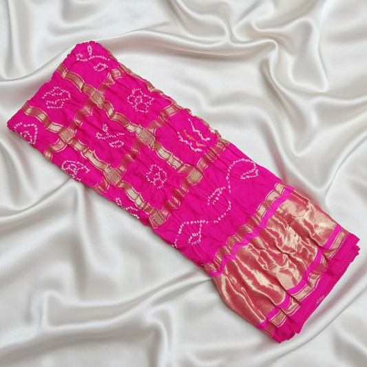 pure gajji silk pink gharchola bandhani blouse piece flat lay on white fabric