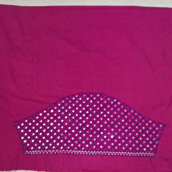 A magenta pink fabric panel featuring a decorative arch-shaped embroidered and mirror-work section at the bottom with white, pink, and blue details.