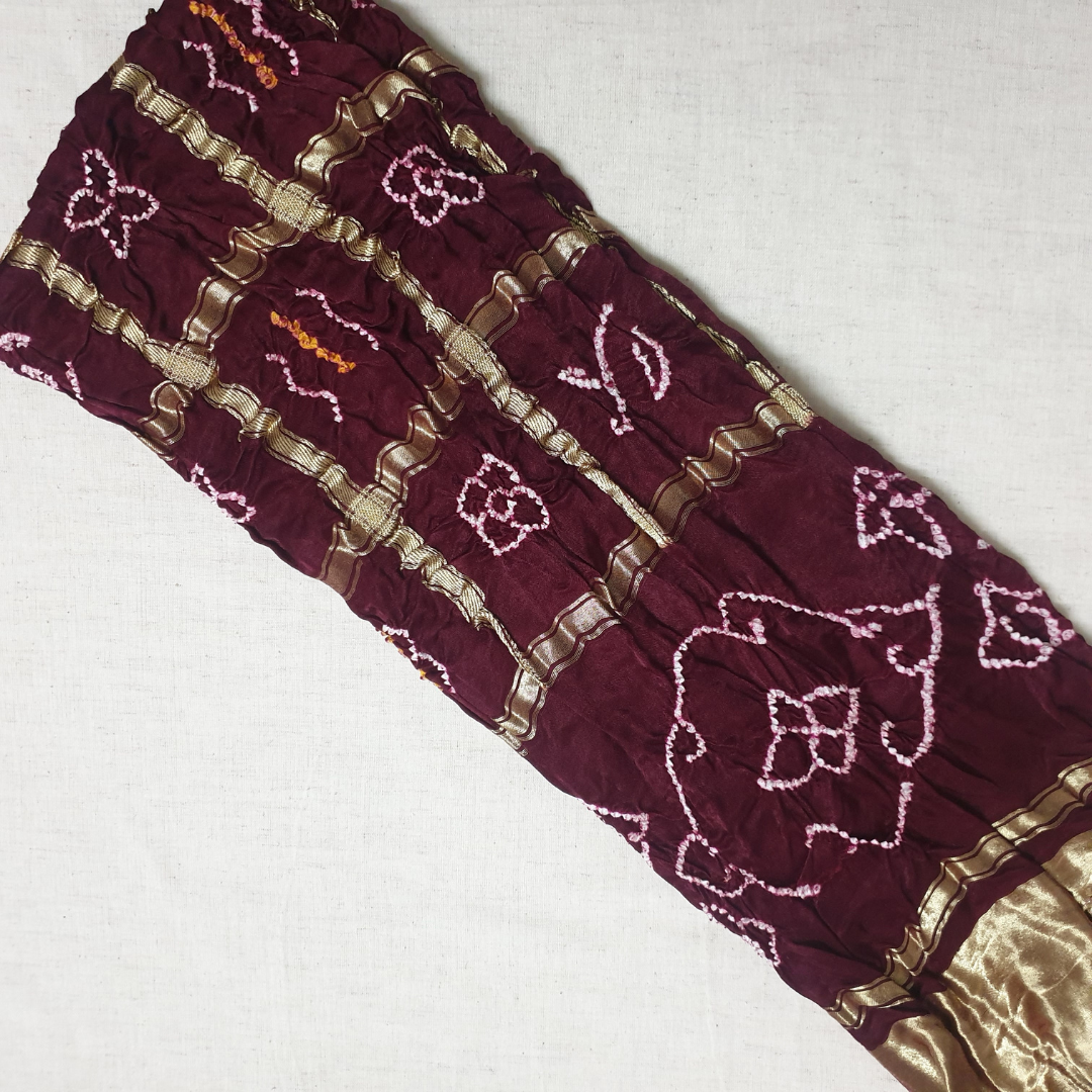 DARK MAROON GAJJI SILK GHARCHOLA BANDHANI BLOUSE PIECE flat lay on white background