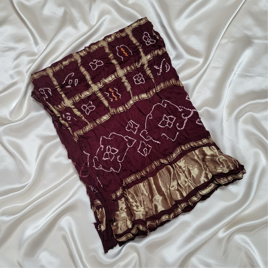 close up of pure gajji silk maroon gharchola bandhani blouse piece