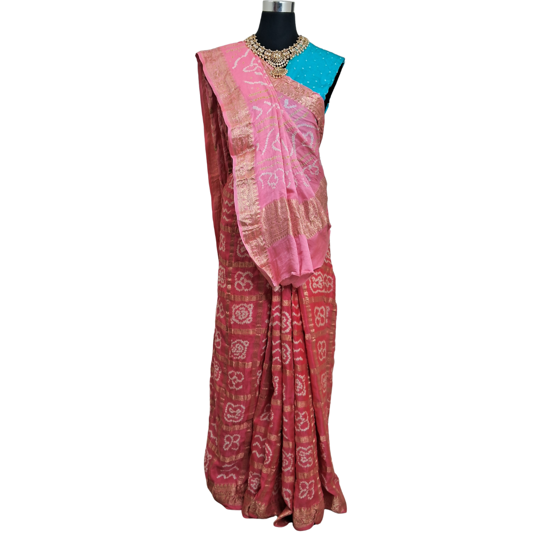 pure gajji silk gharchola bandhani saree with blue blouse piece on mannequine