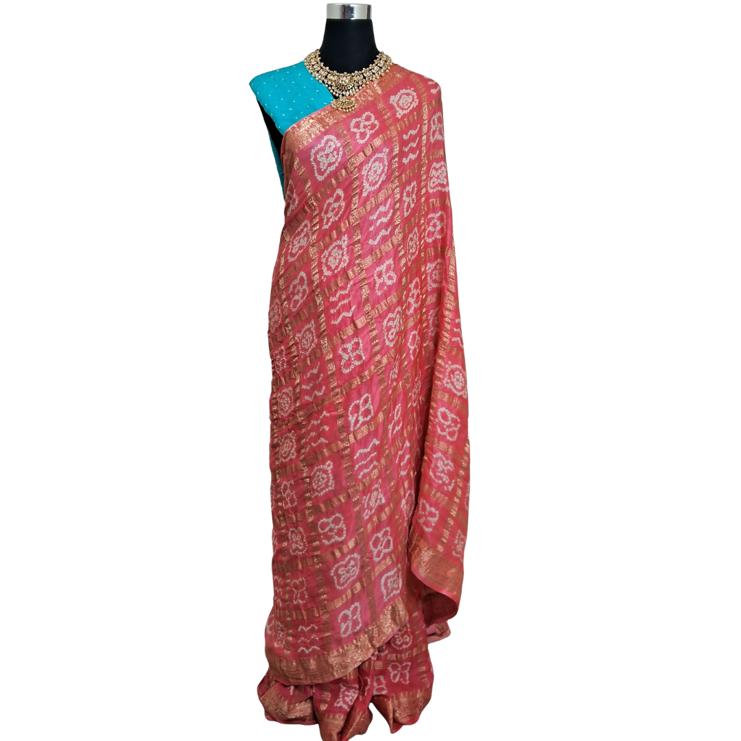 pure gajji silk gharchola bandhani full saree picture on mannequin with blue blouse piece