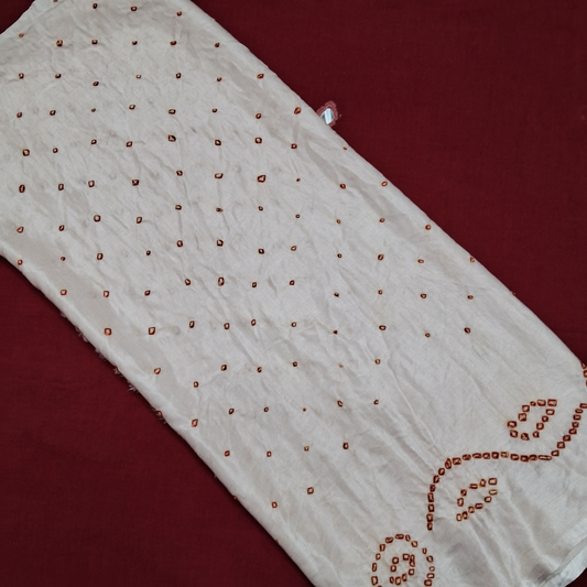 pure gajji silk red bandhani on White  fabric on a red background