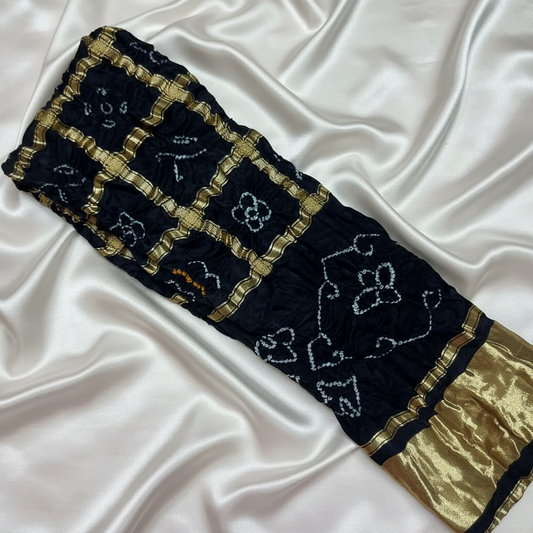 pure gajji silk gharchola bandhani blouse piece flat lay on white fabric