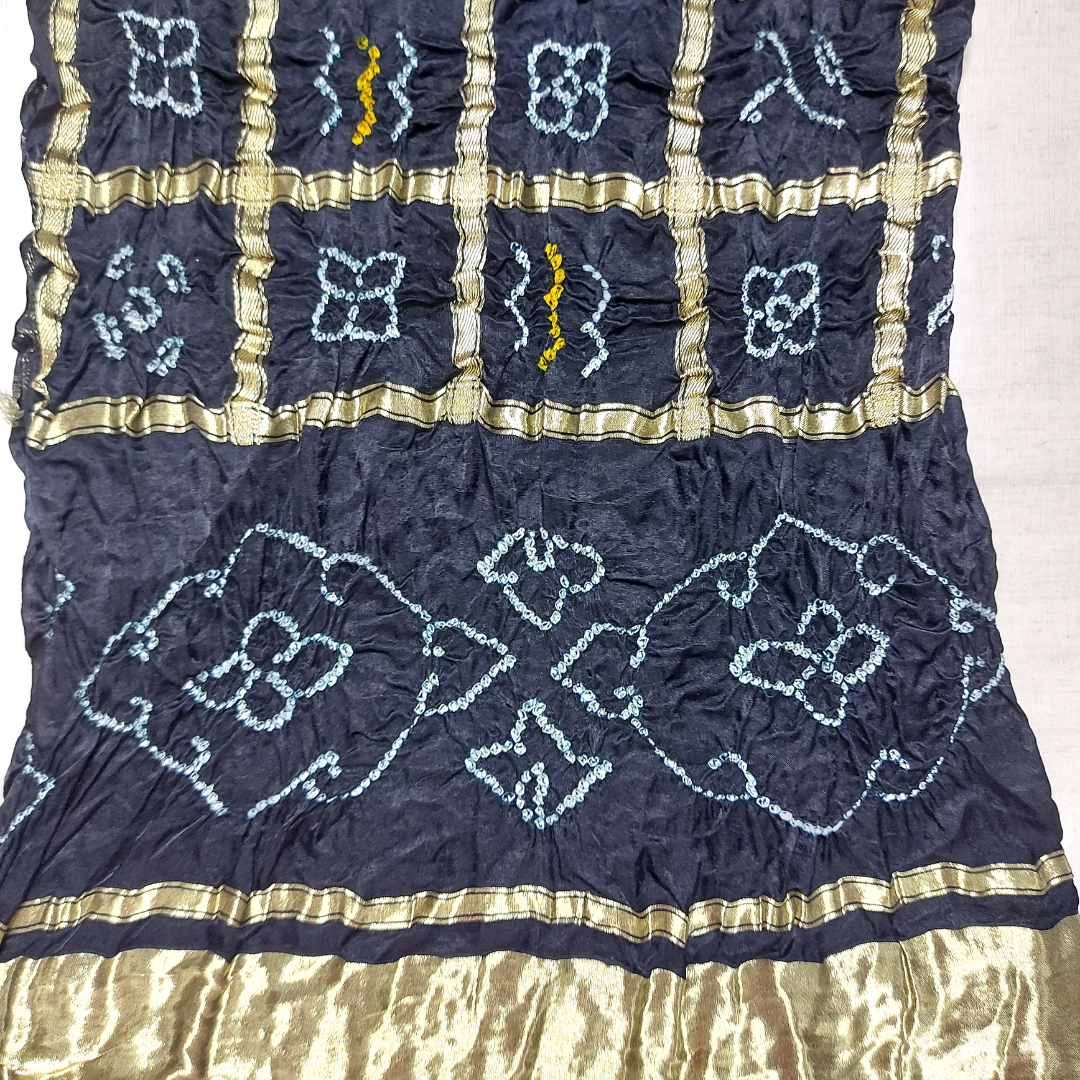 close up of black gharchola bandhani blouse piece
