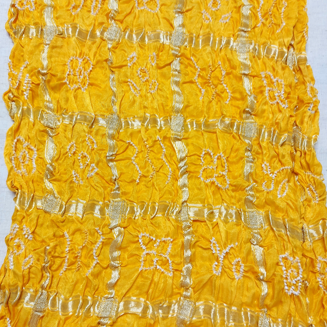 close up of yellow gharchola bandhani blouse piece